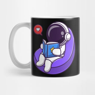 Astronaut Reading Book On Beanbag Cartoon Mug